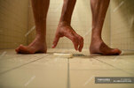 focused_124539314-stock-photo-man-picking-up-soap.jpg focused_124539314-stock-photo-man-picking-up-soap.jpg